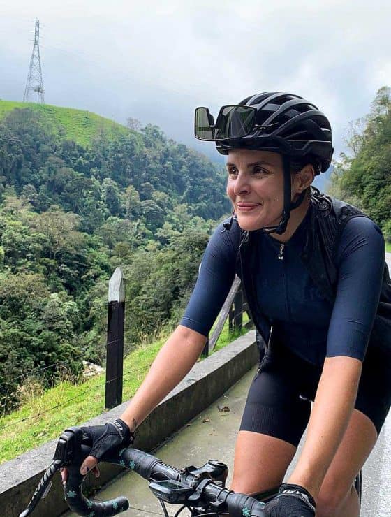 Woman cycling in Colombia on bike tour